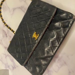 Unique Vintage 1980s Navy Lambskin Single-Flap Chanel with Gold Hardware.